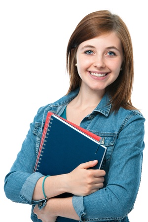 charming young student girl holding exercise books