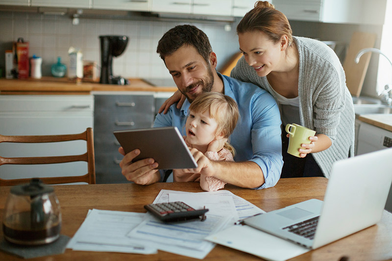 Young family enjoying time home